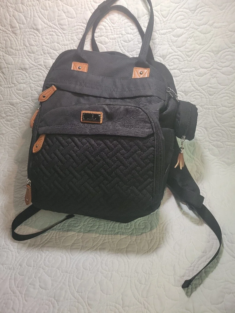 Black Quilted Backpack with Tan Accents